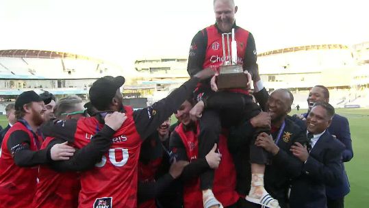 Army cricketers lift captain Liam Fletcher aloft as he holds the IST20 trophy at Lord's