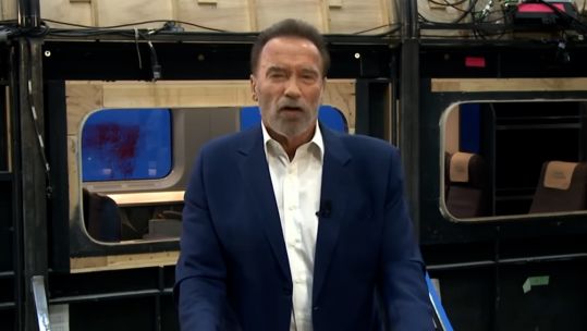 Arnold Schwarzenegger speaking at the Austrian World Summit climate conference
