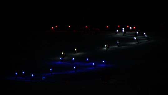 Athletes descend Meribel slope during Opening Ceremony