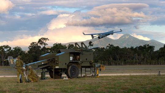 Australian Army soldiers from 20th Regiment, Royal Australian Artillery, launch an Integrator tactical UAV at Shoalwater Bay training area in Queensland