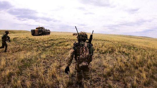 Troops during a live fire exercise in the Canadian station.