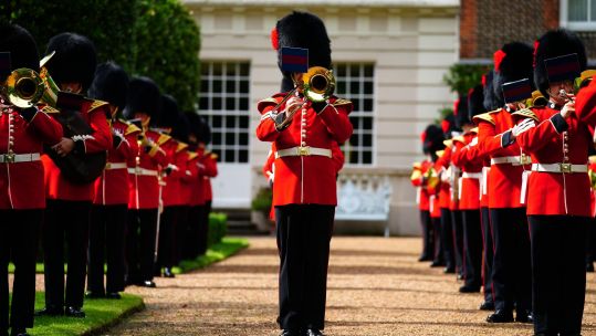 Band of the Coldstream Guards playing Three Lions and Sweet Caroline in Clarence House Gardens