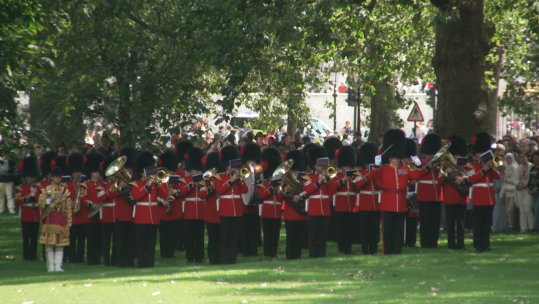 Band of the Coldstream performing in Green Park to mark Queen Camilla's birthday