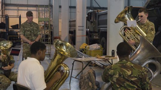 Band of the Grenadier Guards in Belize helping train a new military band for the country