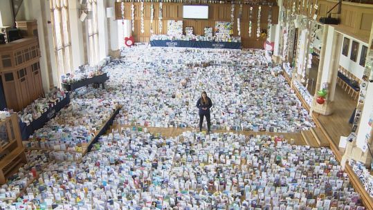 Bedford school dining hall filled with birthday cards for Capt Tom Moore 290420 CREDIT BFBS.jpg 