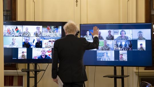 Boris Johnson holds a Christmas video call from the Cabinet room with UK Armed Forces personnel deployed around the world and UK 221220 CREDIT NO 10 DOWNING STREET
