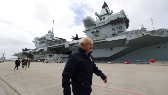 Boris Johnson with HMS Queen Elizabeth alongside at Portsmouth Naval Base ahead of maiden operational deployment 210521 CREDIT NUMBER 10/FLICKR