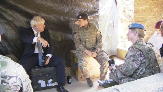 Boris Johnson with troops on Salisbury Plain.