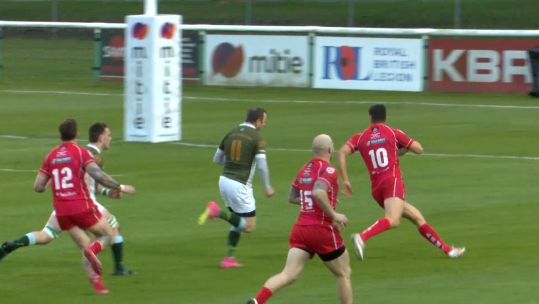 British Army fly half Jack Johnson sprints for the try line against the Irish Defence Force