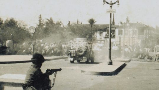 British soldiers fighting against a street riot by EOKA in Nicosia, Cyprus, 1956.