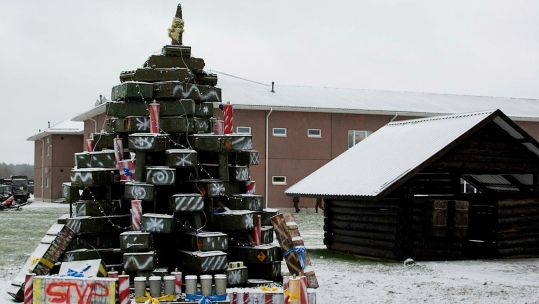 British troops in Tapa Camp, Estonian troops create a Christmas tree out of ammunition boxes CREDIT MOD