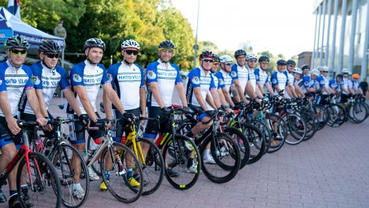 British, Danish and Estonian NATO personnel line up to take part in NATO Velo, a 1000km cycle across Estonia organised by NATO's enhanced Forward Presence 150820 CREDIT NATO