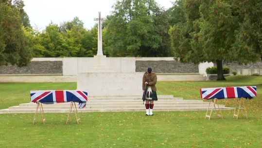 Burial service for two unknown soldiers at Loos