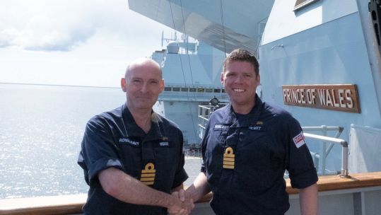 Captain Richard Hewitt taking over as Commanding Officer of HMS Prince of Wales from Captain Steve Higham 