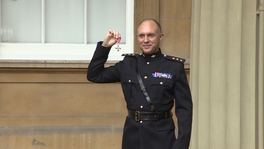Captain Rudd with his MBE