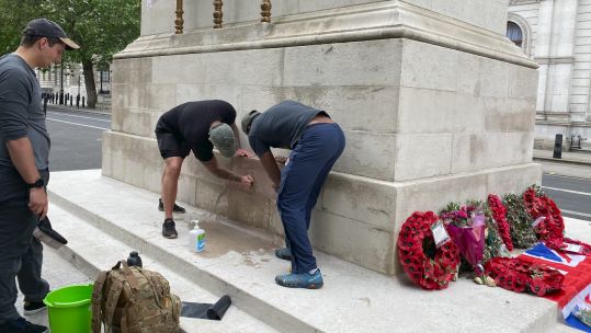Cenotaph in London being cleaned up after being vandalised 080620 CREDIT BFBS.jpg 