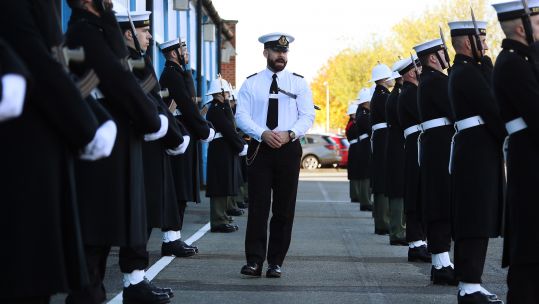 Ceremonial Training Officer Warrant Officer Eddie Wearing inspects the two rows of Guards at HMS Excellent ahead of Remembrance Sunday 041120 CREDIT ROYAL NAVY .jpg