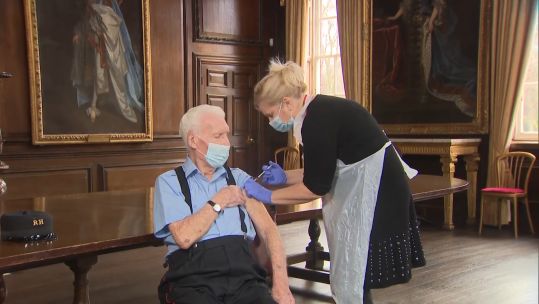 Chelsea Pensioner Bob Sullivan, a 98-year-old D-Day veteran who fought in the Second World War, receiving a COVID-19 vaccine
