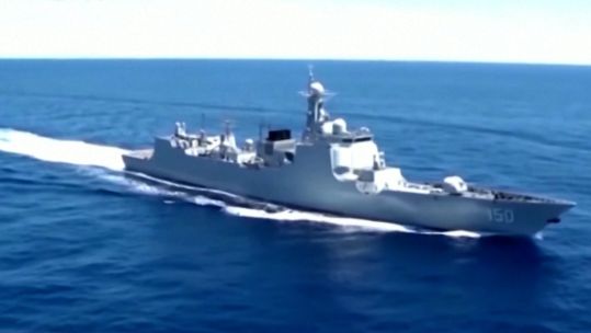 Chinese Navy ship taking part in a live-firing exercise near Taiwan 