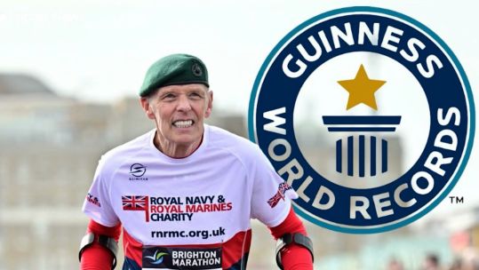 Chris Terrill, an honorary Royal Marine, achieving a Guinness World Record for the fastest marathon on crutches 070325 CREDIT BFBS
