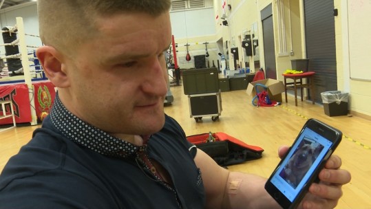 Blind veteran Rob Long listens to Twitter