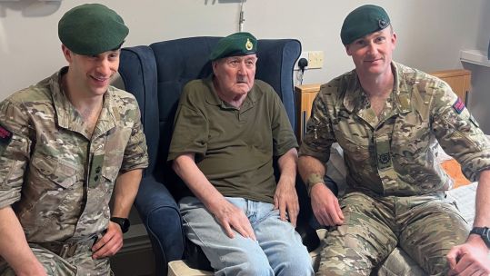 Lieutenant Colonel Sam Fearn presented the new beret to Mr Preece