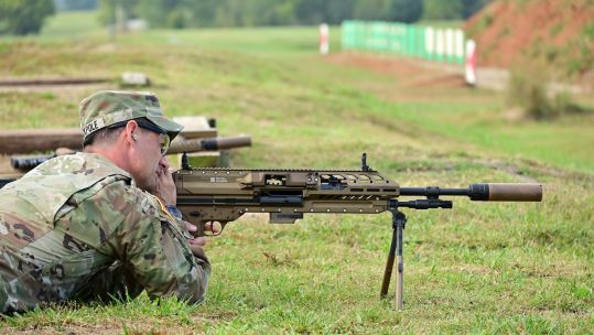 Command Sgt. Maj. Chad Stackpole fires a XM250 Fort Campbell 250923 CREDIT US DEPARTMENT OF DEFENSE