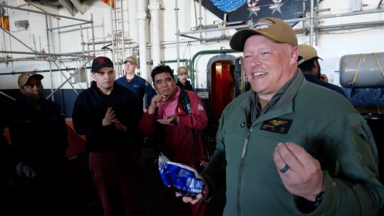 Commanding officer, Captain Chris 'Chowdah' Hill USS Dwight D Eisenhower meeting crew CREDIT BFBS