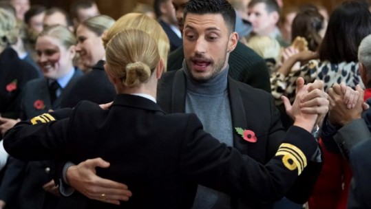 Contestant Giovanni Pernice dances with a member of the Royal Navy (Picture: MOD).