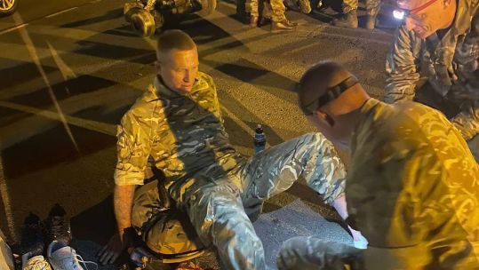 Corporal James Kirby receives medical attention after his completes his fundraising challenge CREDIT Corporal James Kirby