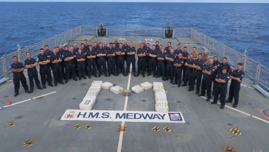 Crew of HMS Medway with the cocaine they seized in the Caribbean, which came as one of three interceptions with an estimated £81m of cocaine seized