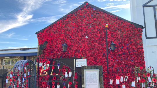 Crochet poppies covering a local Royal British Legion club in Surbiton, Surrey