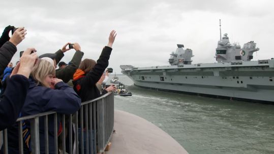 Crowds wave off HMS Queen Elizabeth as she sets sail