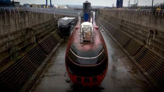 Decomissioned nuclear submarine in a dry dock
