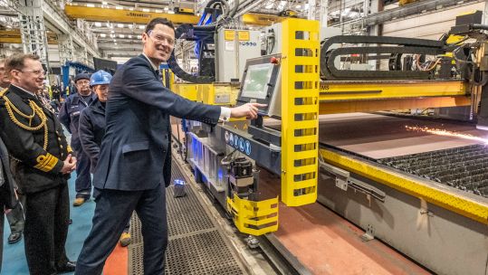 Defence Minister Alex Chalk cuts the first steel on Type 31 frigate HMS Active at Babcock's facility in Rosyth (Picture: Babcock).