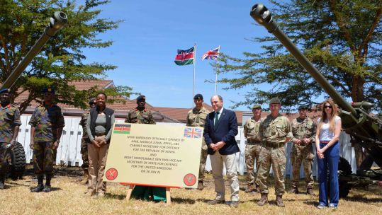 Defence Secretary Ben Wallace and Monica Juma, Kenyan Cabinet Secretary for Defence, unveil a plaque as they open Nyati Barracks