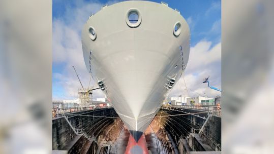 Dock bottom view of HMS Bulwark's newly painted hull and clean lines 27112023 CREDIT HMS Bulwark.jpg