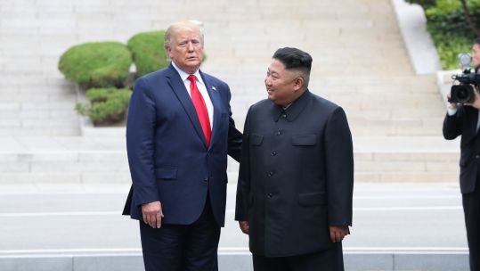 Donald Trump and Kim Jong Un in North Korea 300619 CREDIT YONHAP PA