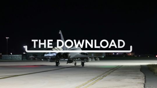Aircraft in the night in the background of the Download Graphic