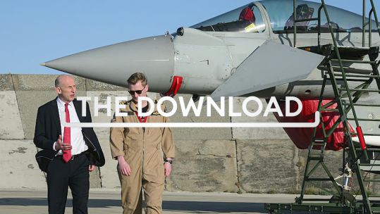 John Healey and Pilot walking