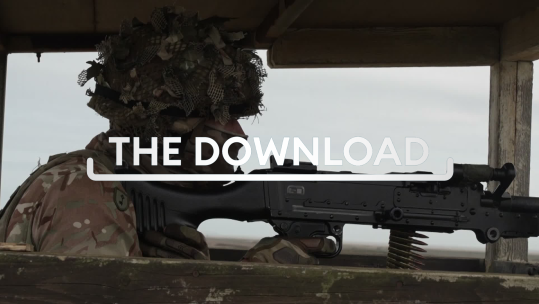 Soldier firing in camo with the Download graphic superimposed 