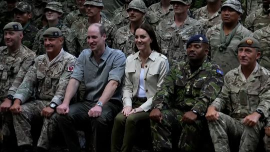 Duke and Duchess of Cambridge meet with soldiers in the Belizean jungle.