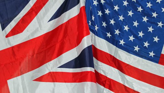 E9HRHN UK and US flags together symbolizing coalition, peace and joint forces between the United Kingdom and United States of America credit Alamy.jpg