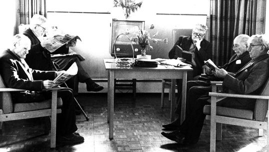 Embankment Fellowship Centre residents reading in TV lounge Veterans Aid archive photo (Picture: Veterans Aid).