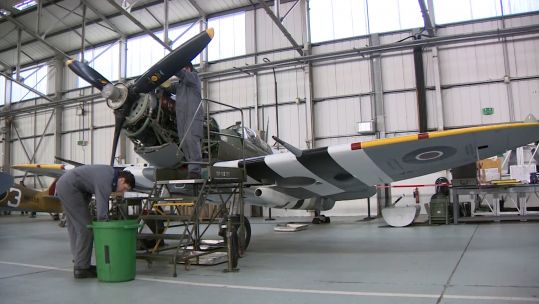 Engineers work on an aircraft from the Battle of Britain Memorial Flight.