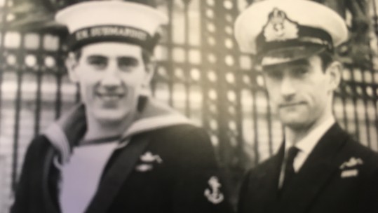 Leading Mechanic James McWilliams and Eric Thompson outside Buckingham Palace with the Queen's Gallantry Medal and MBE
