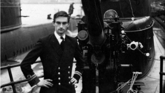 Cdre Eric Thompson standing by the gun in HMS Andrew in 1969