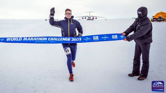 Ex-RAF paratrooper Luke Wigman crossing the finishing line in Antarctica 11022023 CREDIT PA, World Marathon Challenge