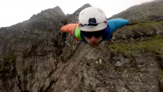 Ex-Royal Marine becomes first person to wingsuit off UK mountain 240820 CREDIT TIM HOWELL SLASH JOTTNAR