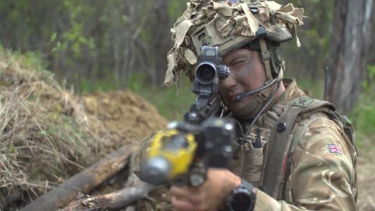 Exercise Maple Resolve soldier aiming weapon